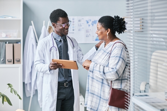 Male talking speaking with his female patient