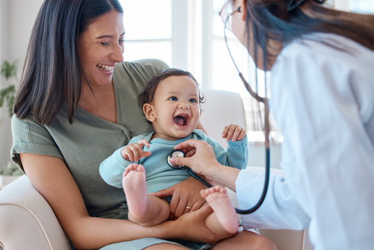 Baby with mom at doctor