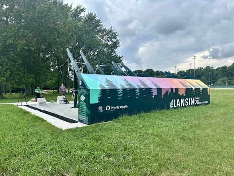 Outdoor Priority Health fitness court in a Lansing MI park