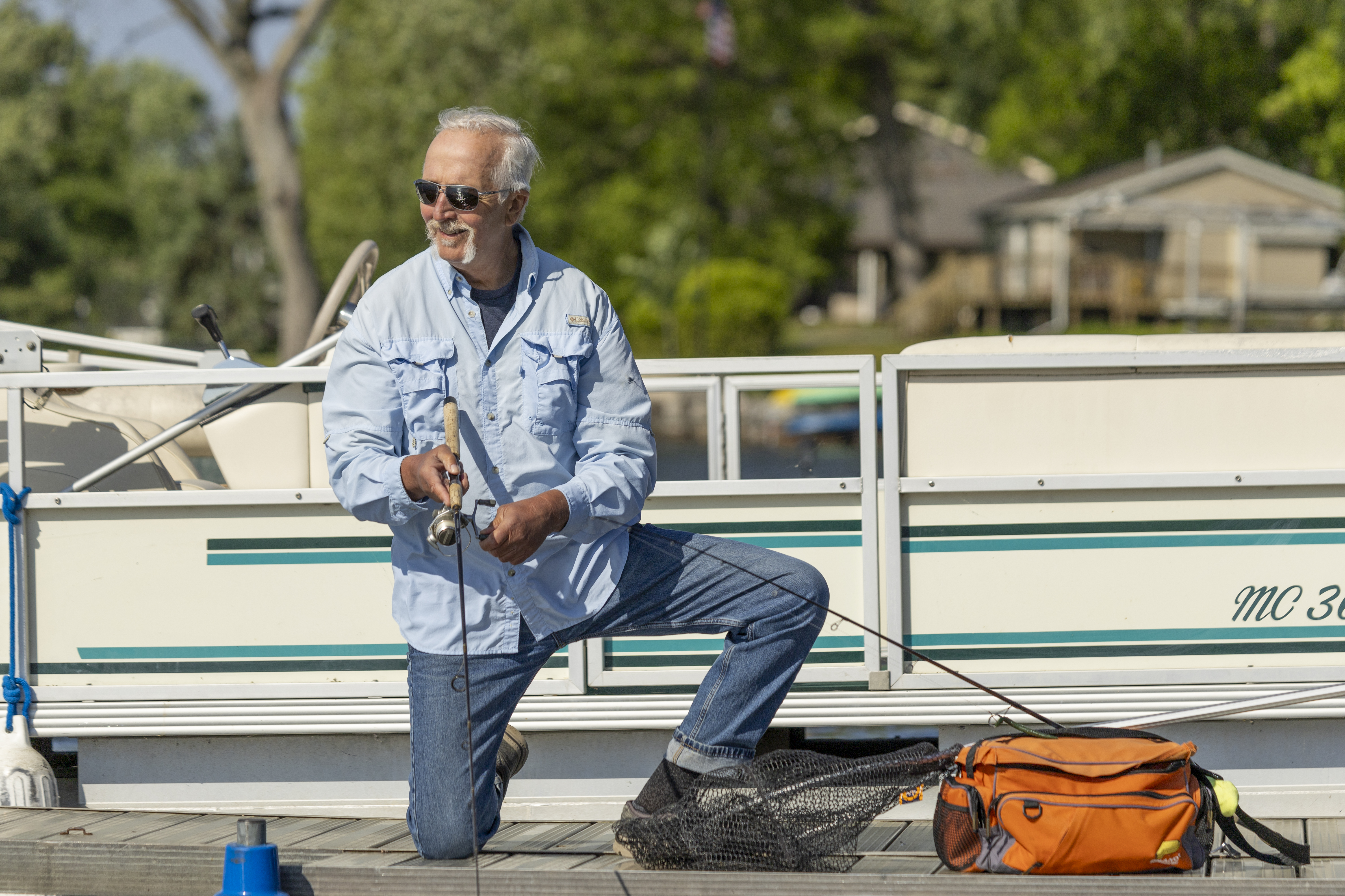 Satch fishing on his dock